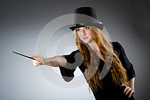 Woman magician doing her tricks