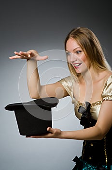 Woman magician with magic wand