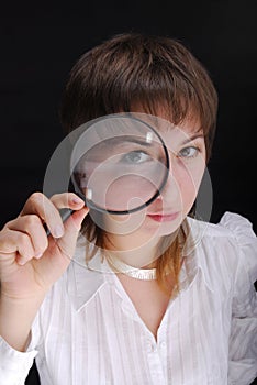 Woman and magnifier