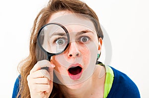 Woman with magnifying glass