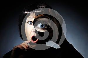 Woman with magnifying glass