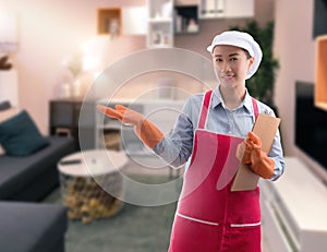 Woman maid presenting home cleaning services