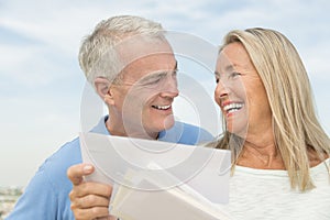 Woman With Mails Looking At Man Against Sky