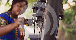 Woman maintaining bike performance