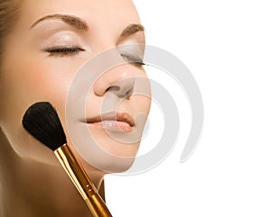 Woman with a make-up brush