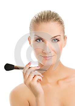 Woman with a make-up brush