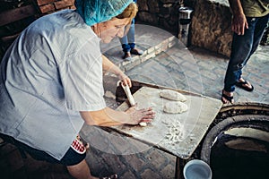 Woman makes bread