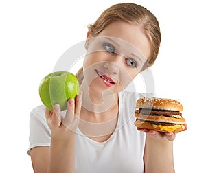 Woman makes choice, healthy and unhealthy foods