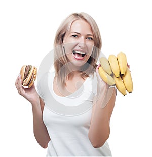 Woman makes choosing burger and bananas