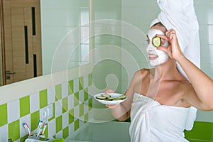 The woman makes a face mask after shower in the morning.Beauty treatments for the skin