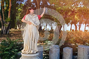 Woman makes hand gesture like philosopher in antique Rome