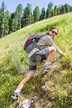 Woman makes mountain hiking