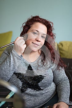 Woman makeup at home.