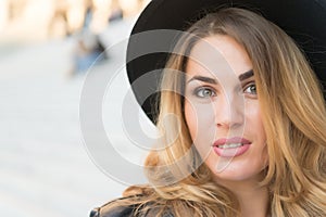 Woman with makeup on sensual face in la defense, paris