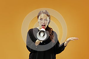 Woman making announcement with megaphone