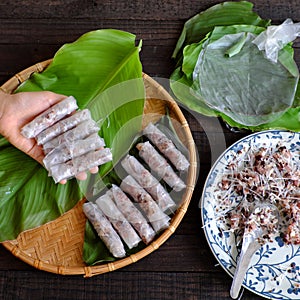 Woman making cha gio at home photo