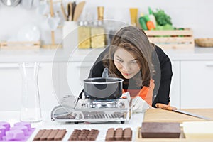 Woman making chocolate