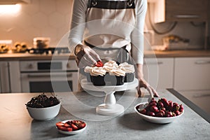 Woman making chocolate muffins