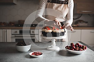 Woman making chocolate muffins