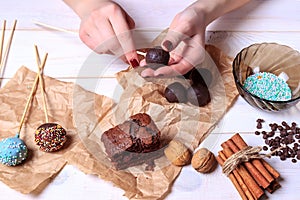 Woman making chocolate popcakes. Cake pops making. Pop cakes.