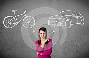 Woman making a choice between bicycle and car