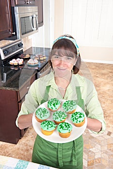 Woman making cupcakes