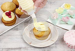 Woman making cupcakes
