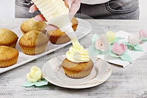 Woman making cupcakes