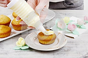 Woman making cupcakes