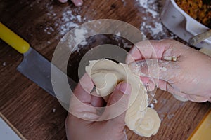 Woman making curry puff