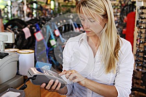 Woman making debit payment photo