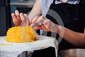 Woman during making decorating cake