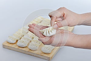 A woman making dumplings