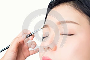 Woman is making eyebrows. skin beauty and health, for spa products and make up. The skin is smooth and beautiful.