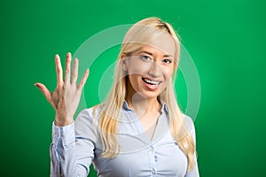 Woman, making five times sign gesture with hand fingers