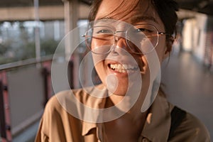 Woman making funny hilarious face to camera.