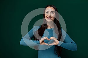 Woman Making Heart Shape With Hands
