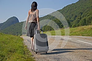 Woman making of hitch-hiking