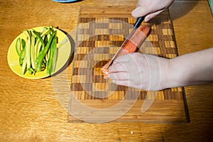 Woman making at home Japanese sushi rolls. Making at home Japanese-style hand-rolled sushi