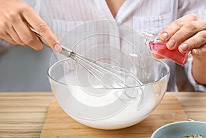 Woman making natural handmade soap at table, closeup