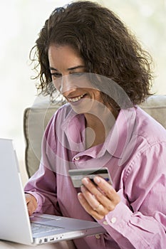 Woman making online purchase