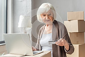 Woman making online purchase with credit