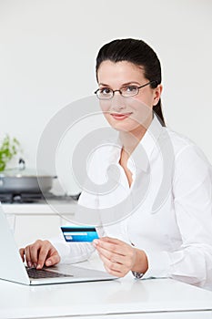 Woman Making Online Purchase At Home