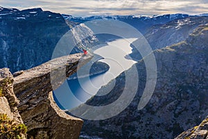 Woman making Selfie on Trolltunga