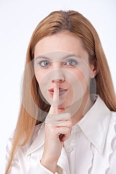 Woman making silence sign