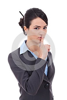 Woman making silence sign