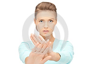 Woman making stop gesture