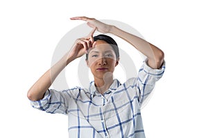 Woman making a timeout hand gesture