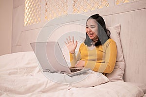 A woman making video calls with her friend