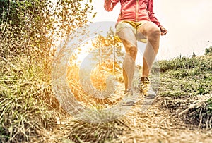 Woman making workout and running on the hills.